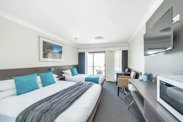 Standard Twin Family room with partial ocean view