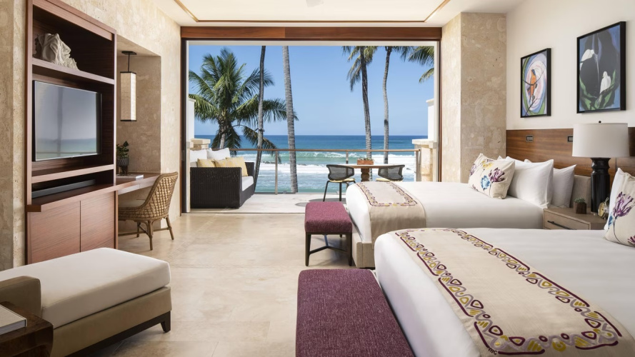 Standard Quadruple room with balcony and beachfront