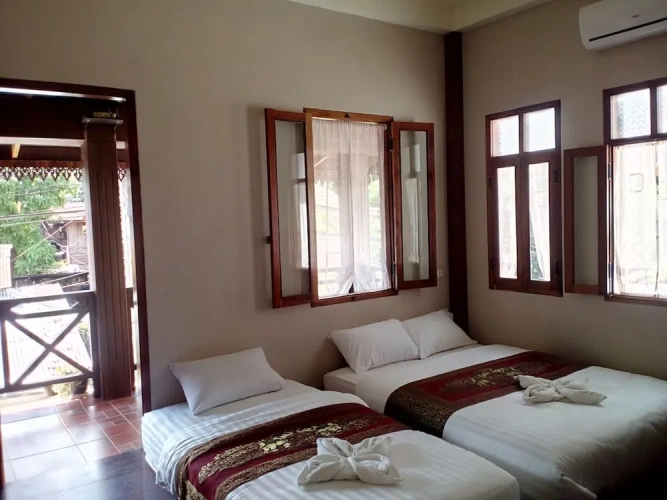Standard Triple Family room with balcony and with city view