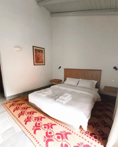 Standard Triple room with garden view