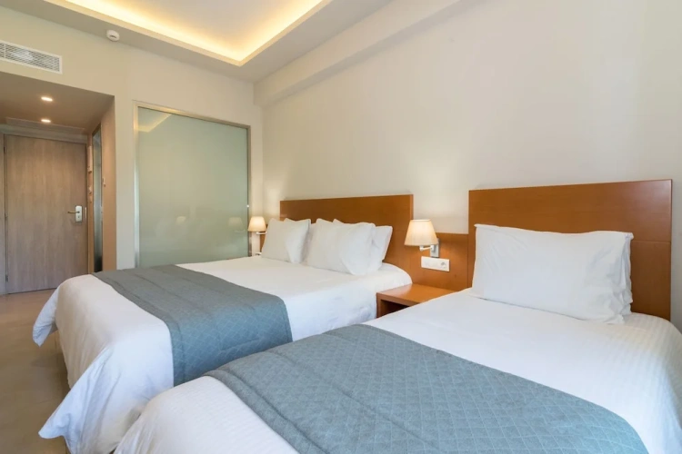 Standard Triple room with balcony and with garden view