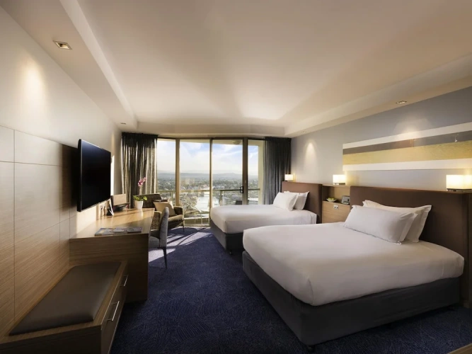 Classic Quadruple room with balcony and with city view