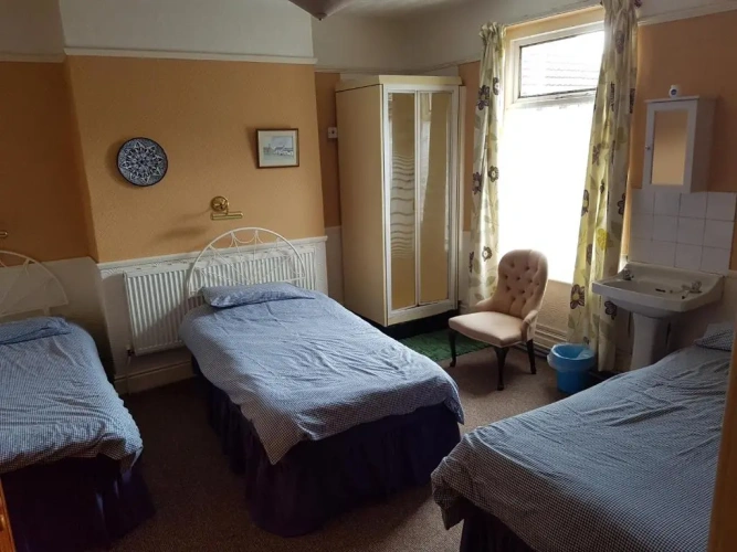 Deluxe Quadruple Family room