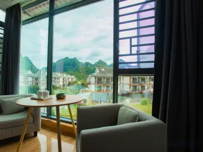 Libo Xiaoqikong Xinjiayuan Inn