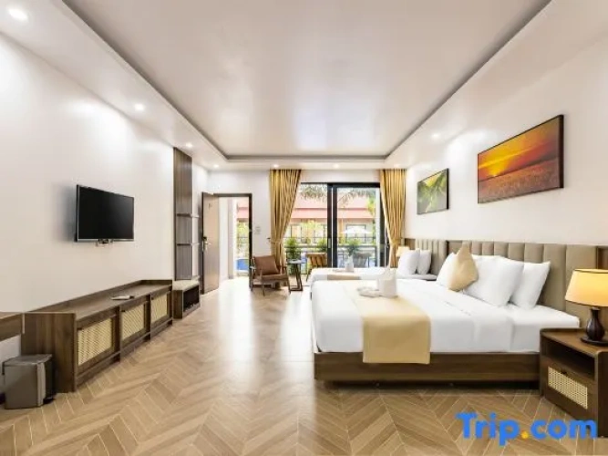 Standard Triple room with garden view
