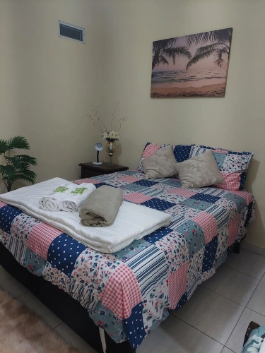 Deluxe Triple room with balcony and with garden view