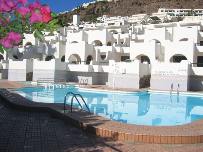 Studio with pool view