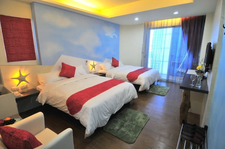 Comfort Quadruple room with balcony and with partial ocean view