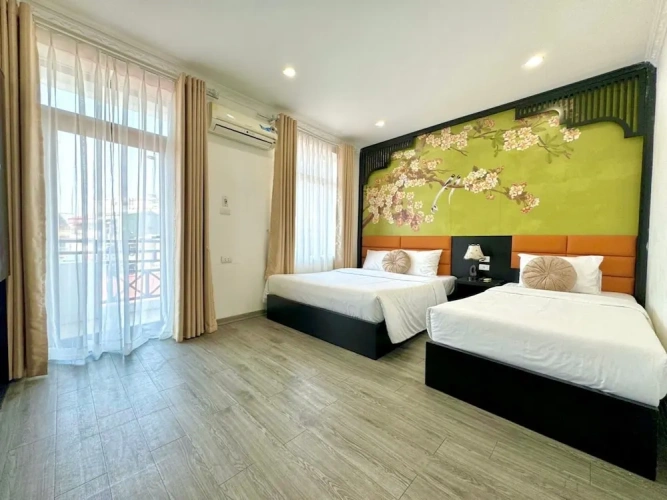 Standard Triple room with balcony and with city view