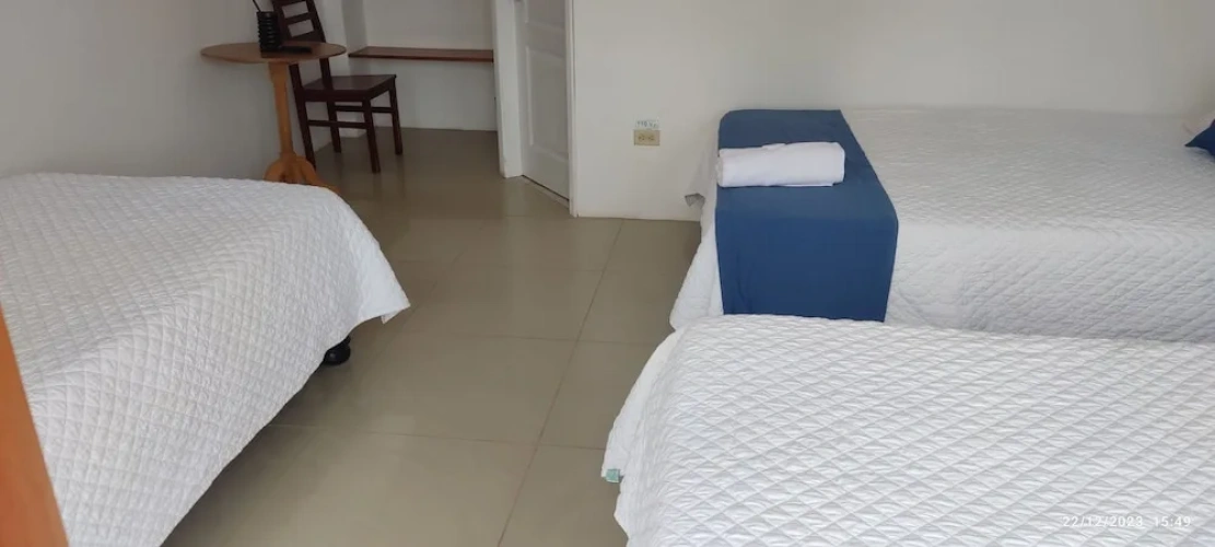 Standard Triple room with garden view