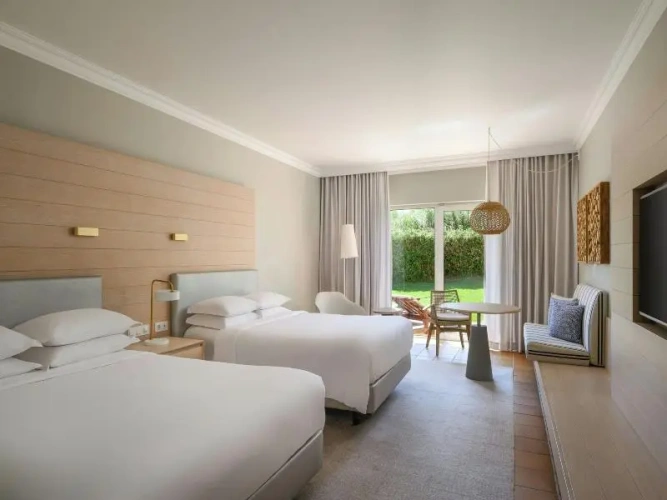 Standard Quadruple room with garden view