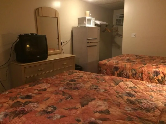 Deluxe Quadruple room with balcony