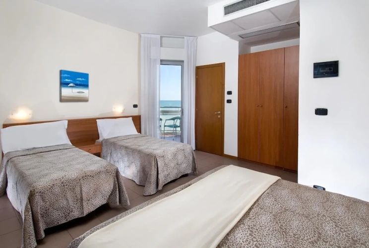 Standard Quadruple Family room with balcony and with sea view