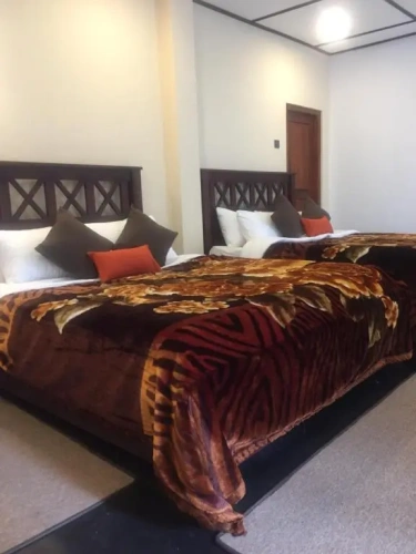 Deluxe Quadruple room with balcony