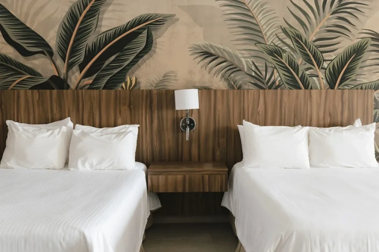 Deluxe Quadruple room with balcony and beachfront