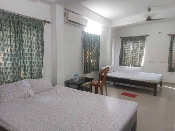Deluxe Quadruple room with balcony