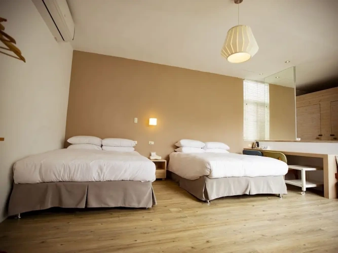 Deluxe Quadruple room with balcony and with garden view