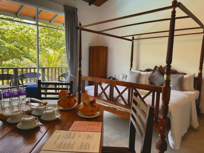 Standard Quadruple Family room with balcony and with garden view