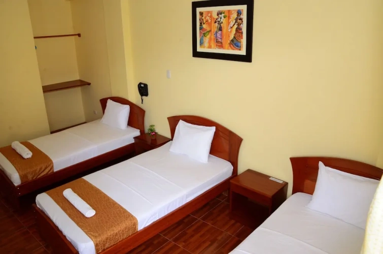Standard Triple room with balcony and with garden view