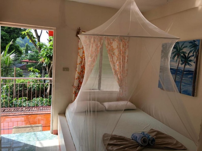 Standard Triple room with garden view