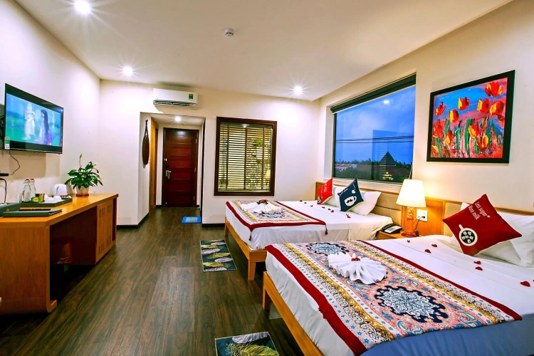 Deluxe Triple room with balcony