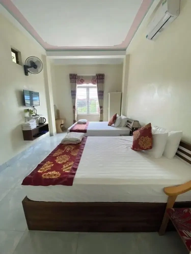 Standard Quadruple room with garden view