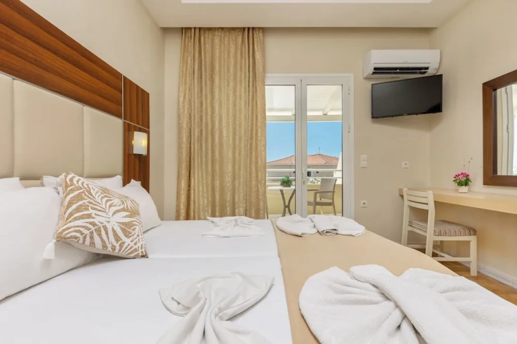 Superior Triple room with balcony and with pool view