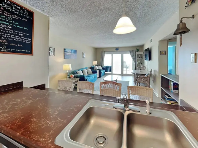 A Wave From It All by Topsail Realty