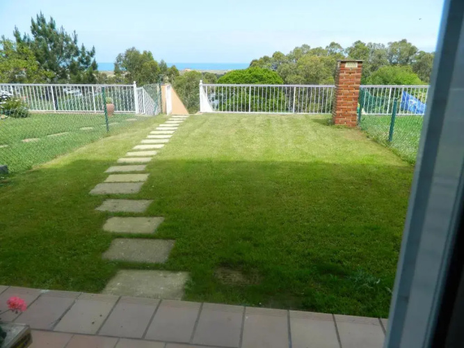 Apartamento con jardin privado junto playa Usil - Mogro