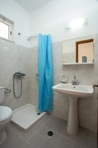 Standard Triple room with garden view