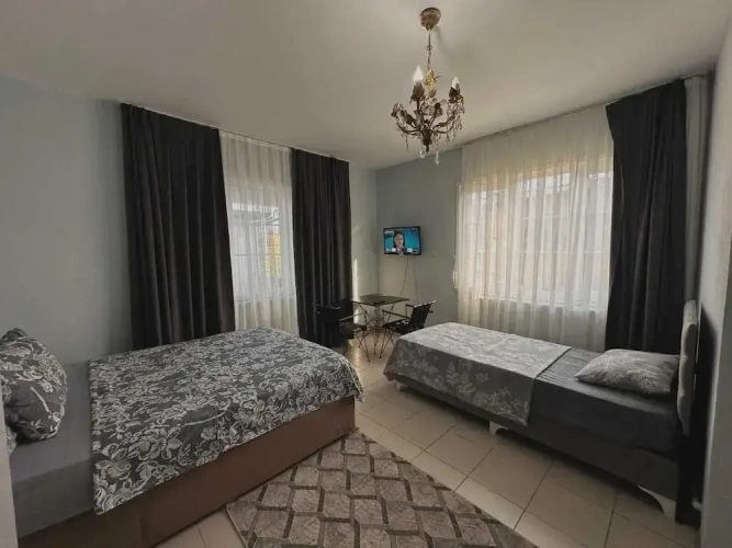Standard Triple room with courtyard view