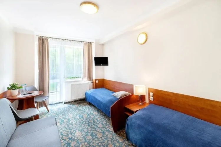 Standard Triple room with balcony and with garden view