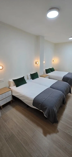 Standard Quadruple room with balcony and with city view