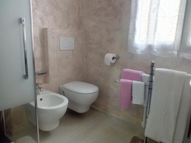Standard Quadruple room with garden view