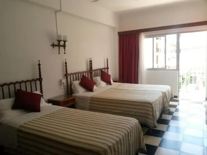 Standard Triple room with balcony