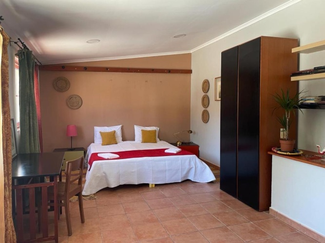 Standard Quadruple room with garden view