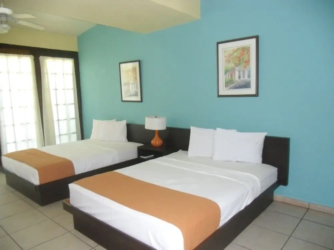 Superior Quadruple room with balcony and beachfront