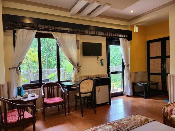 Standard Quadruple room with garden view