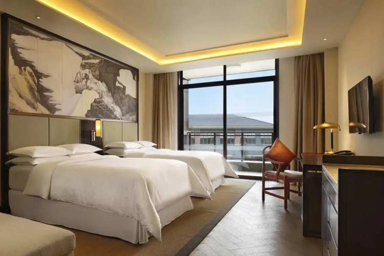 Standard Quadruple room with balcony and with garden view