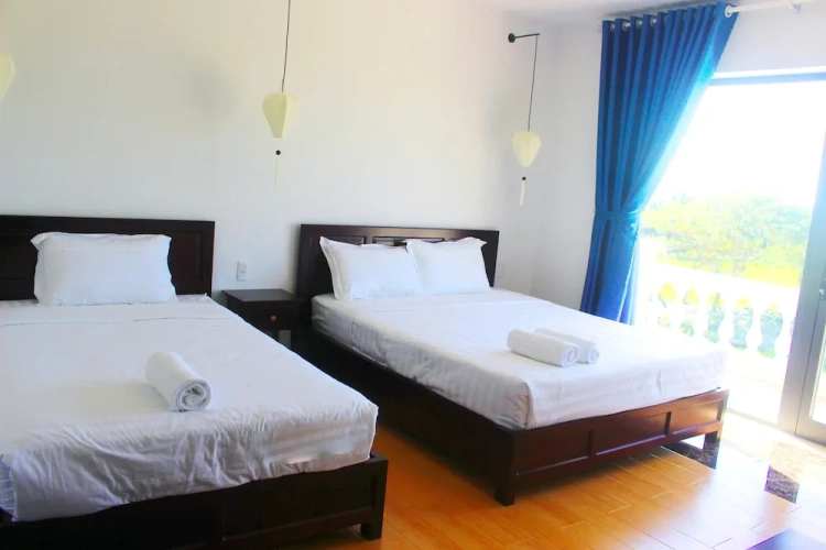 Deluxe Triple room with garden view