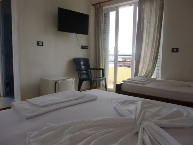 Standard Quadruple room with balcony and with sea view