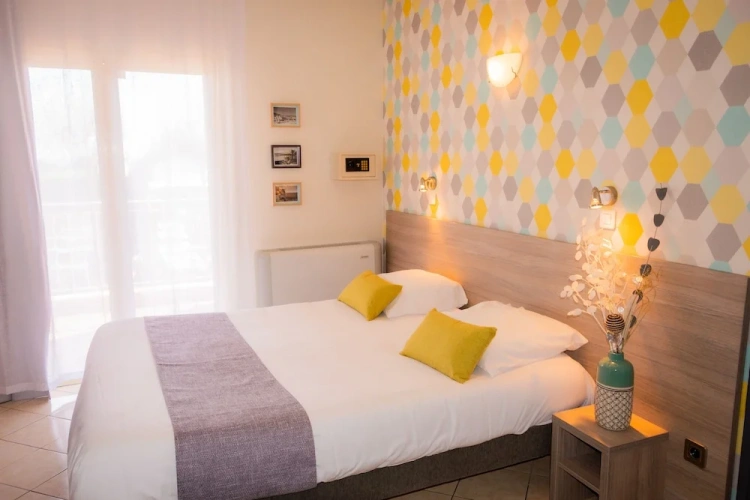Comfort room with balcony and with partial sea view