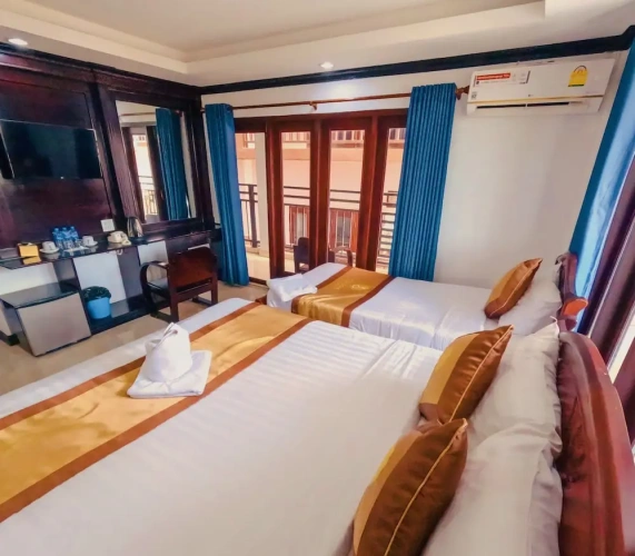 Deluxe Triple room with balcony and with mountain view