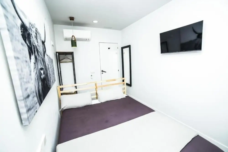 Standard Quadruple room with balcony and with city view