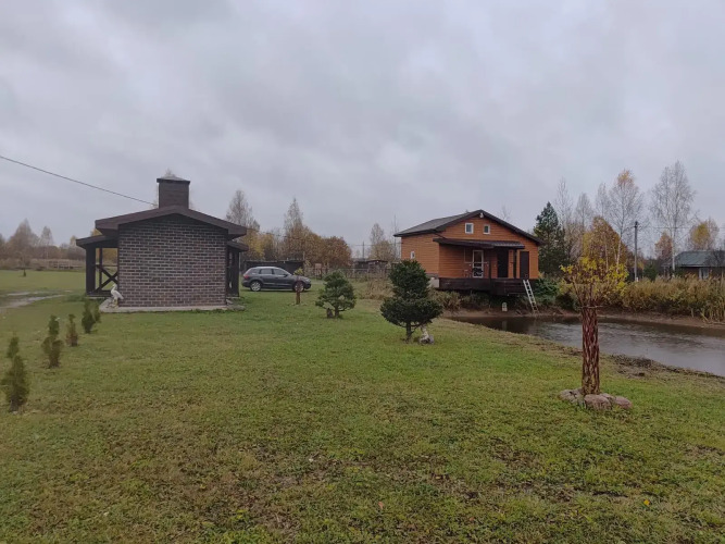 Фотография номера Коттеджа Дом с баней и пирсом на берегу пруда