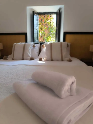 Standard Triple room with garden view