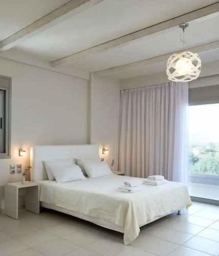 Standard Triple room with balcony and with partial sea view