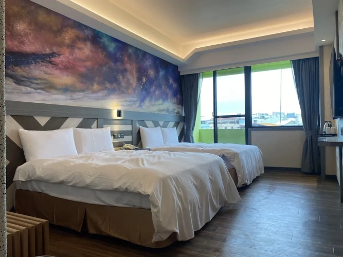 Deluxe Quadruple room with balcony