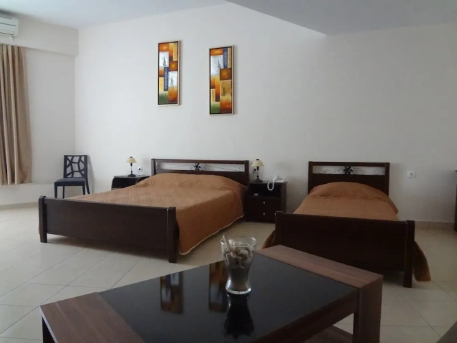 Standard Triple room with balcony and with garden view