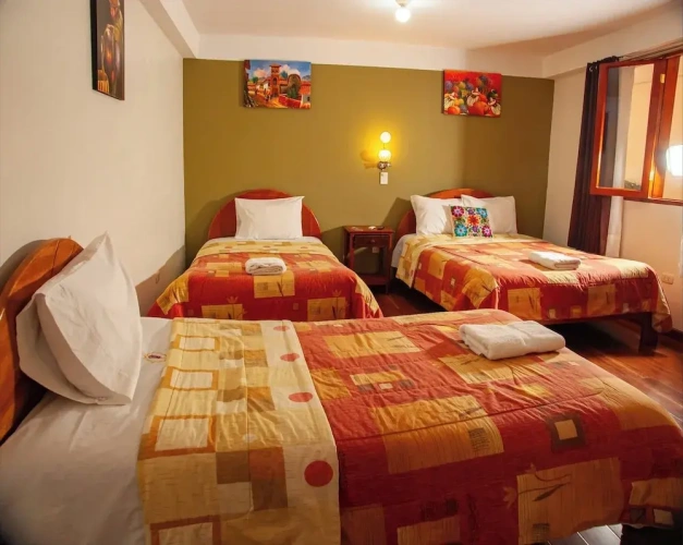 Standard Triple room with balcony and with courtyard view